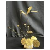 Signed brass sculpture on onyx base