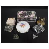 Group of jewelry boxes and perfume bottles