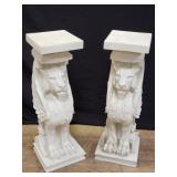 Pair of composite winged lion pedestals