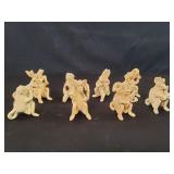 Eight vintage hand made ceramic figurines