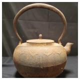 Antique iron tea pot