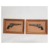 Pair of composite western revolver plaques