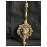 Brass lion head wall mount