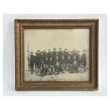 Framed antique photo of a cavalry troop
