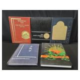 Five U.S. Navy cruise books