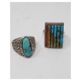 Pair of silver and turquoise rings