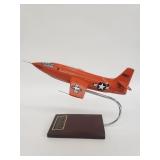 Bell X-1 model plane on stand signed by Chuck