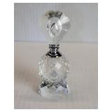 Crystal and metal perfume bottle