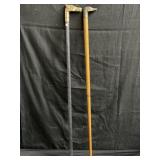 Pair of vintage walking canes with brass animal