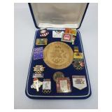 Olympic pins and commemorative coin