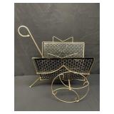 Mid-century brass rolling magazine rack