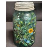 Jar of vintage marbles
