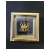 Small metal wall plaque depicting Don Quixote