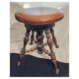 Antique carved claw & ball metal foot stool
