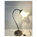 Vintage brass lily pad gooseneck desk lamp with a