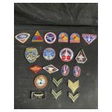 Collection of military, NASA, CHP patches