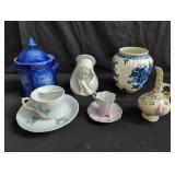 Collection of porcelain jars, vase, saucers and