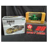 2 die-cast Nascar model cars and Orchard model
