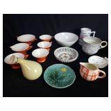 Collection of porcelain tea cups, bowls, mug,