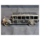 Vintage cast iron bus toy