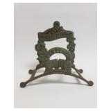 Vintage cast iron garden hose holder