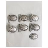 7 silver plate Navajo style belt buckles