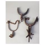 Collection of vintage cast iron and brass spurs