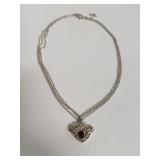 Sterling silver, red, and clear stone heart