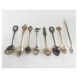Sterling silver souvenir spoons and 1 olive fork