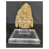 Carved stone tribal mask on Acrylic stand