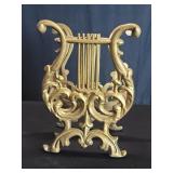 Brass tone aluminum lyre harp magazine rack
