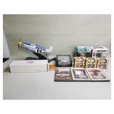 Box of NASCAR toys, Funko Pop, aviation novelty