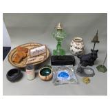 An oil lamp, sewing machine accessories,