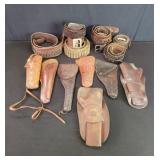 Collection of vintage leather gun holsters and