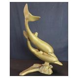Brass dolphins sculpture