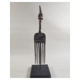 Vintage bronze African comb with stand