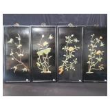 Collection of Asian panels with carved stone