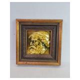 Vintage glazed ceramic plaque in a wood gilt frame