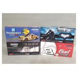 Four NASCAR 1 2:4 scale stock car die-cast models
