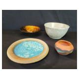 Pair of signed studio art pottery bowls, signed