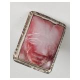 Sterling silver ring with carved stone face