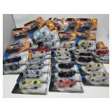 Group of Hot Wheels toy cars in box