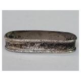Sterling silver napkin ring with an engraved
