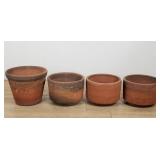 Group of 4 terracotta planter pots