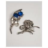 Vintage sterling silver floral brooches, one
