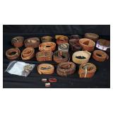 Collection of leather belts, some with buckles