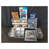 Group of plastic display cases and aircraft m