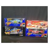 Four NASCAR 1:24 scale diecast model cars