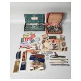 Lot of miscellaneous pins, lighters, pens,