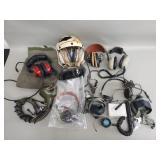 Group of vintage aviation headsets and accessories